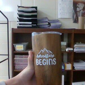 Adventure begins water bottle.